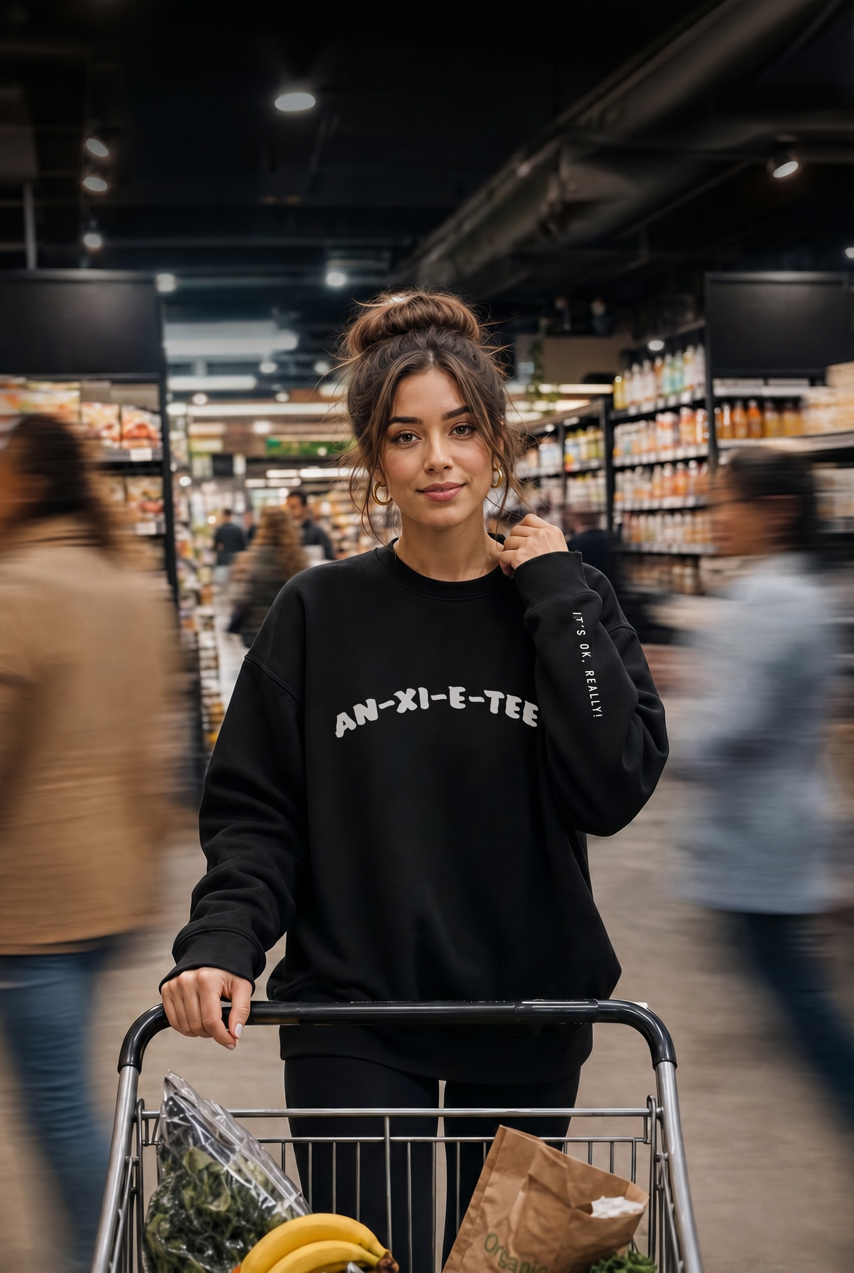 young lady wearing graphic anxiety sweatshirt  mental health awareness 